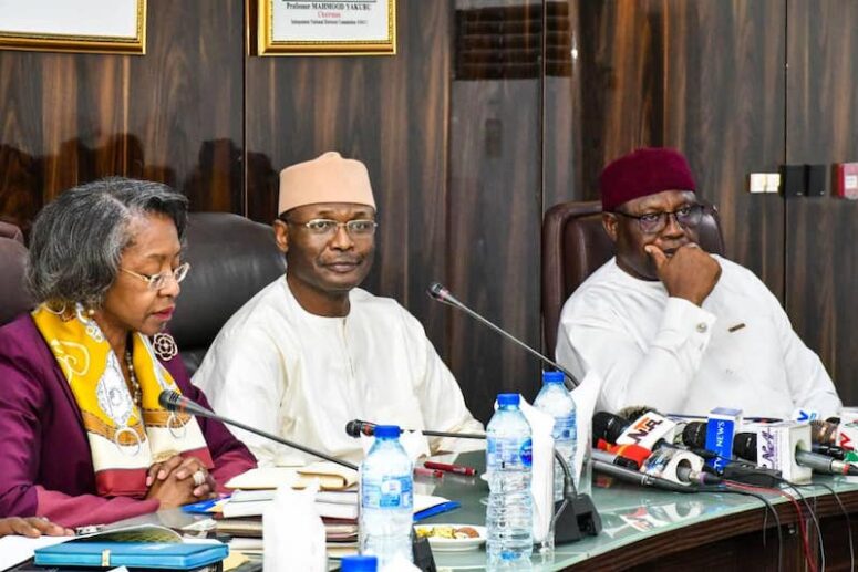 INEC chairman Yakubu, middle, and other officials of the agency