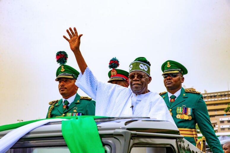 Tinubu inspects the parade