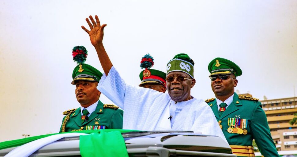 Tinubu inspects the parade